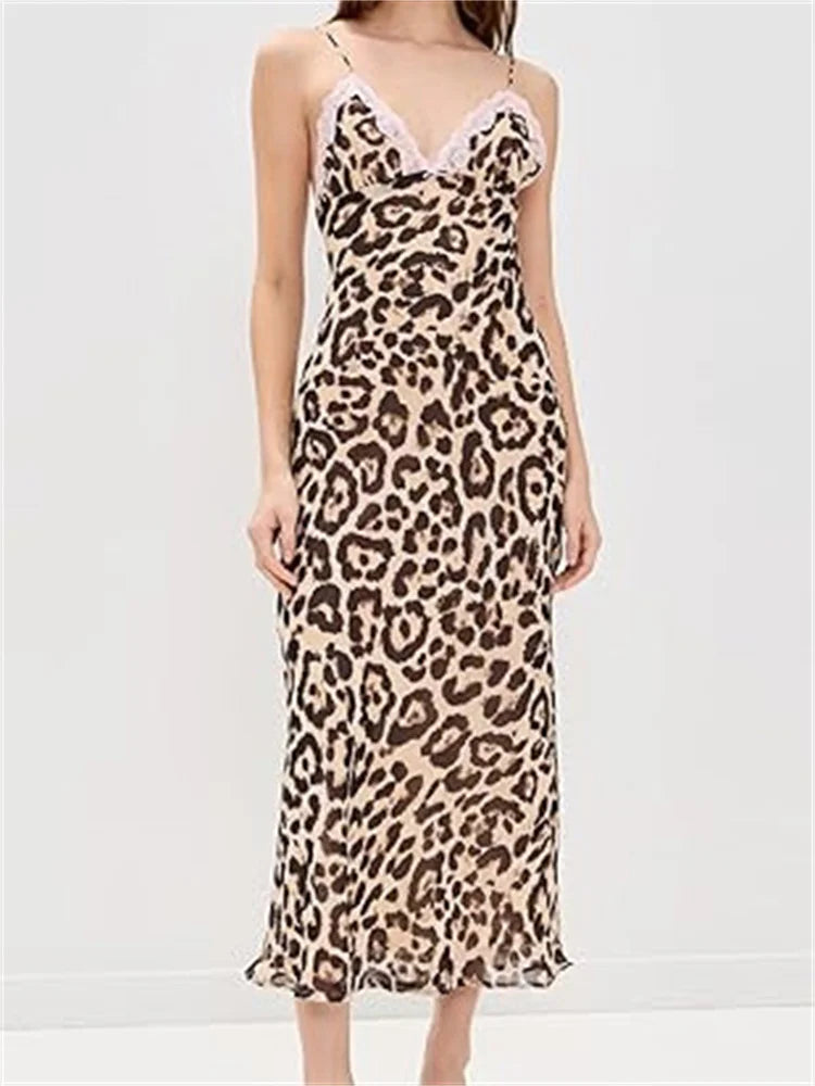 Vestido Largo Chic de Lunares con Cuello en V y Encaje Elegante